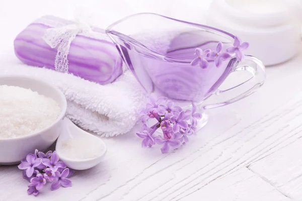 Sea salt and essential oils, purple lilac. spa — Stock Photo, Image