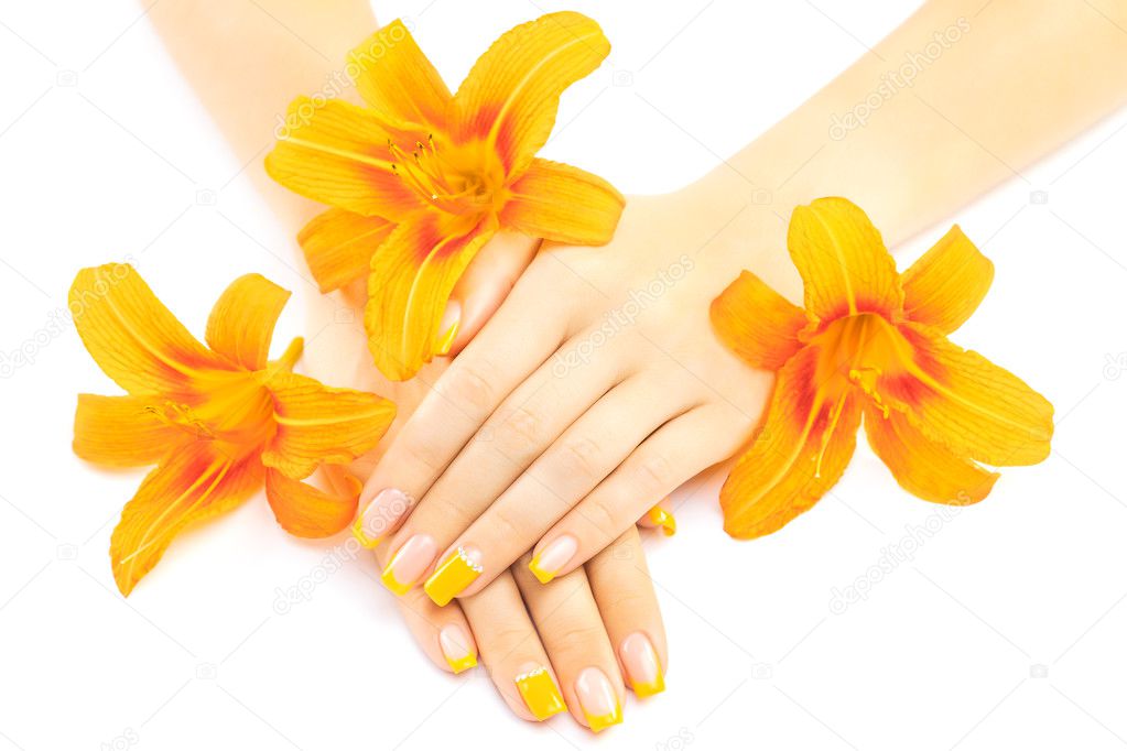 french manicure with orange lily. spa