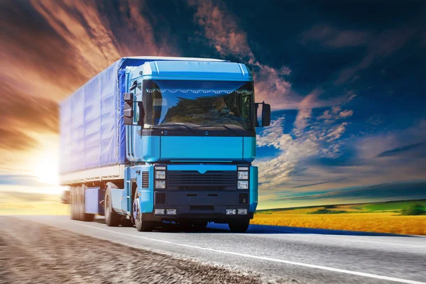 Blue truck on highway — Stock Photo, Image