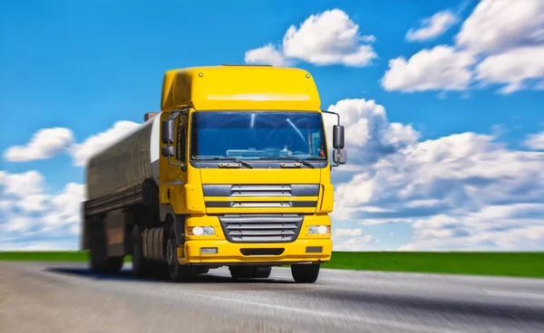 Yellow truck on highway — Stock Photo, Image