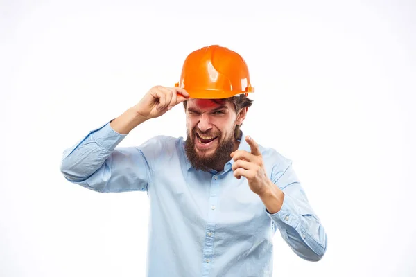 Mérnök narancs biztonsági sisak az építőiparban érzelmek szakmai életmód — Stock Fotó