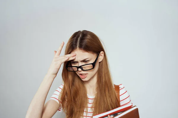 Female student with notepad and backpack on back cropped view education science glasses — Stock Photo, Image