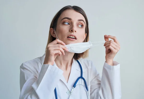 Doctor in medical mask and coat health stethoscope — Stock Photo, Image