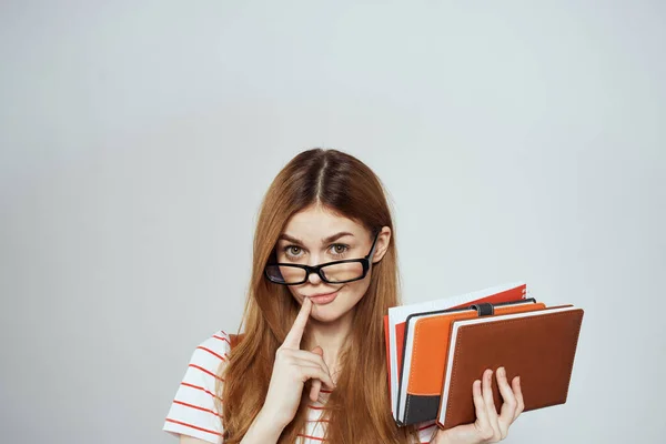 Female student with notepad and backpack on back cropped view education science glasses — Stock Photo, Image