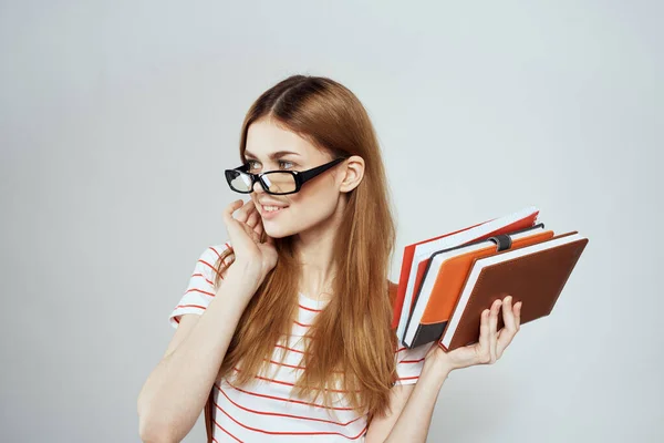 Female student with notepad and backpack on back cropped view education science glasses — Stock Photo, Image