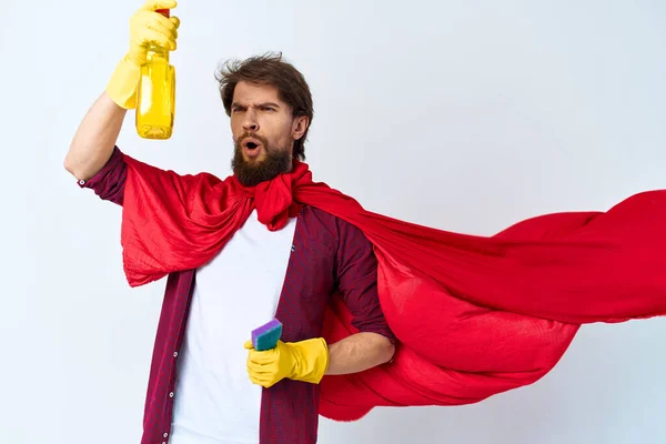 Man with detergent red raincoat professional work