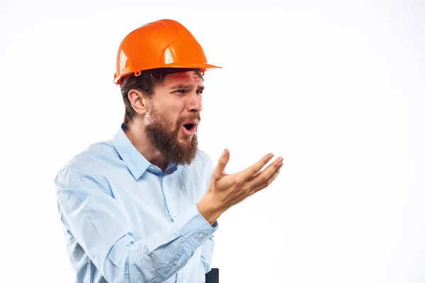 Geschäftsmann mit orangefarbenem Helm — Stockfoto