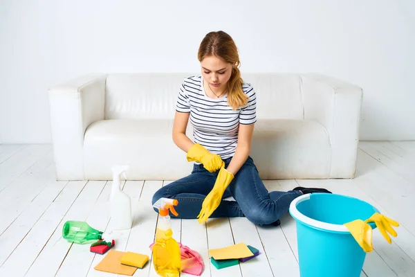 Woman cleaning room cleaning hygiene and interior detergent service