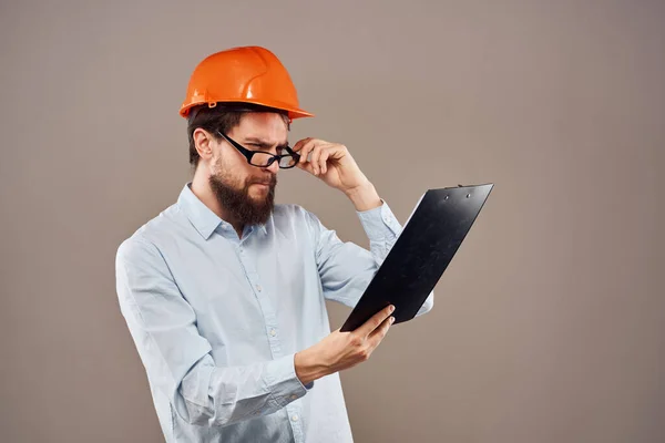 Ingegnere arancio casco lavoro manuale di costruzione — Foto Stock