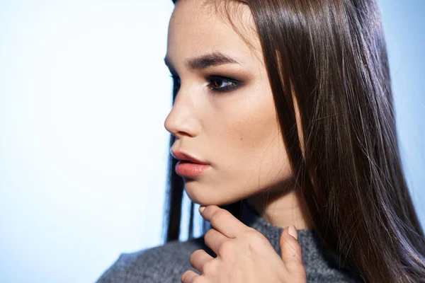 Beautiful woman cosmetics long hair cropped studio model
