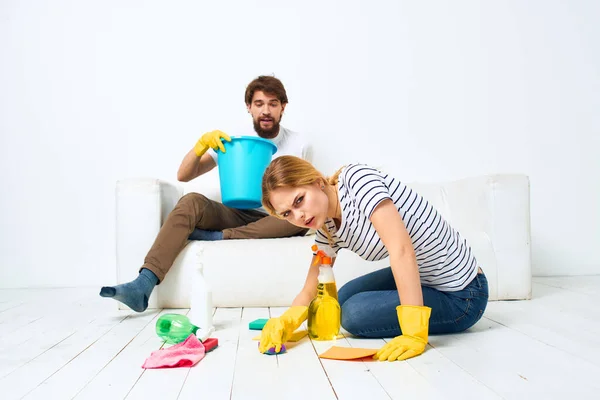 Man and woman washing supplies cleaning housework — Stock Photo, Image