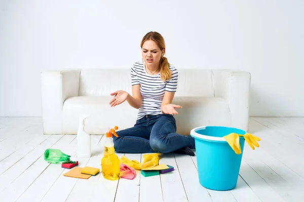 Woman at home near couch rendering services at home interior