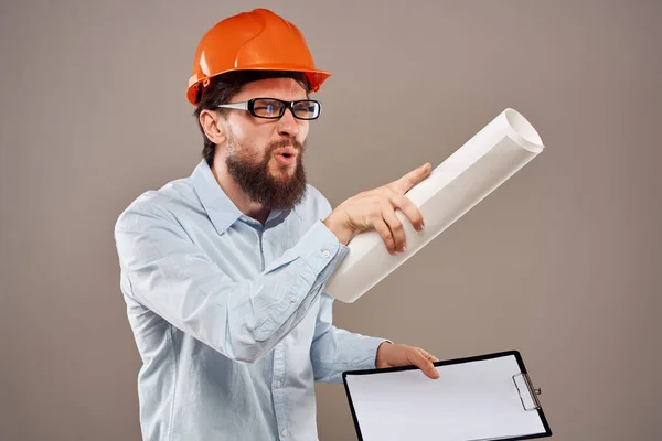 Cheerful man orange hard hat documents professional blueprints construction — Stock Photo, Image