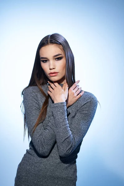 Beautiful woman cosmetics long hair cropped studio model