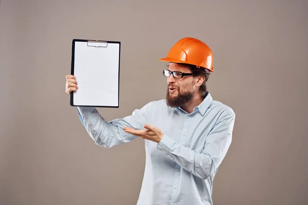 Worker man orange hard hat construction industry manual — Stock Photo, Image