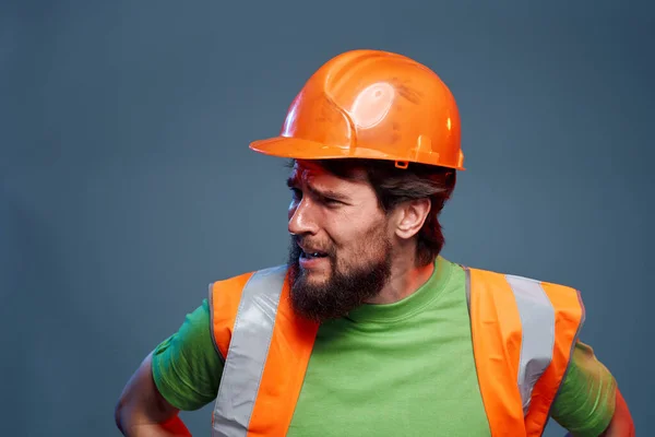 emotional worker orange hard hat construction cropped view