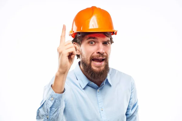 Engineer in orange coloring safety professionals construction emotions hand gestures — Stock Photo, Image
