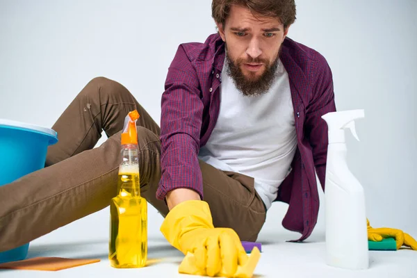 Bearded man detergent cleaning work Professional homework