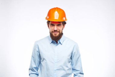 Turuncu renkli inşaat mühendisi profesyonel güvenlik endüstrisi hafif arka plan