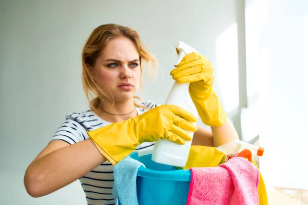 Woman holding in hand detergent cleaning house care lifestyle — Stock Photo, Image