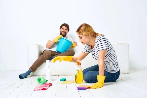 Man and woman washing supplies cleaning housework
