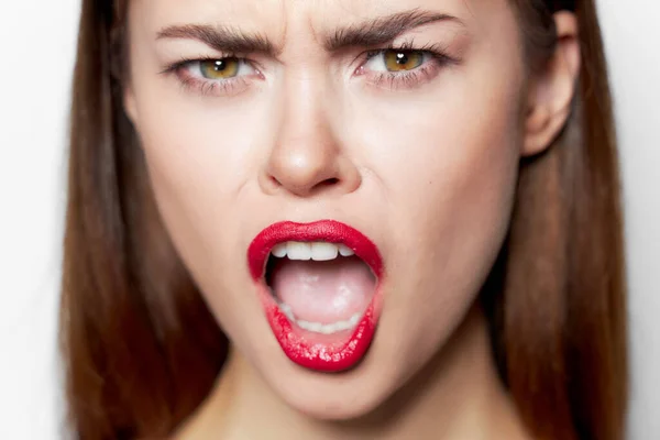 Emotional woman with open mouth face close up studio — Stock Photo, Image