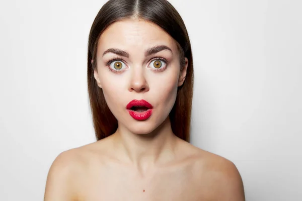 Surprised woman with red lips open mouth nude shoulders — Stock Photo, Image