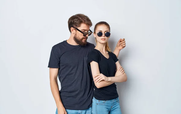 young couple black t-shirts sunglasses studio emotions romance Studio
