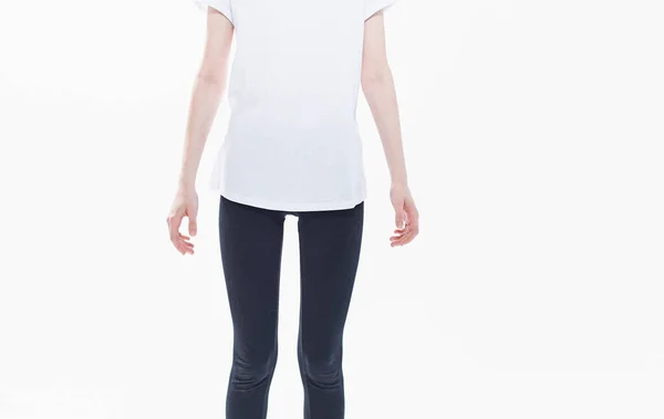 Svart leggings vit t-shirt kvinna ljus bakgrund gester med händer — Stockfoto