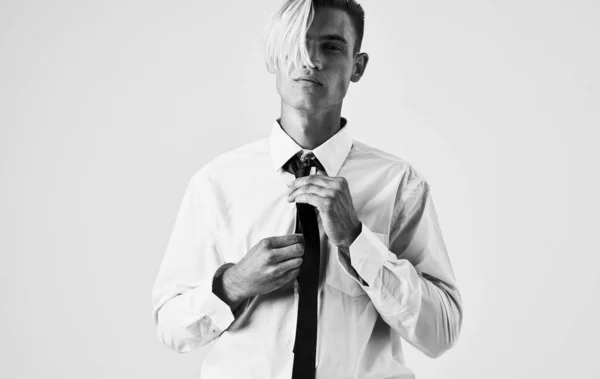 Elegant young man in shirt and tie on a light background cropped view portrait close-up — Stock Photo, Image