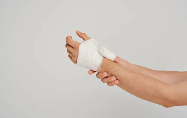 Injured arm bandaging patient health problems medicine — Stock Photo, Image