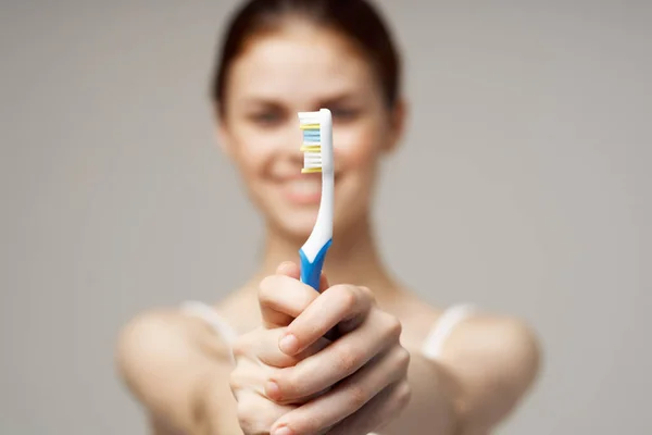 Pretty woman toothbrush oral care morning health hygiene — Stock Photo, Image
