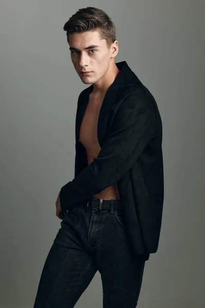 Handsome man black jacket trendy hairstyle elegant style posing models — Stock Photo, Image