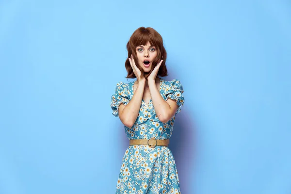 Woman in dress open mouth hands near face short hair — Stock Photo, Image