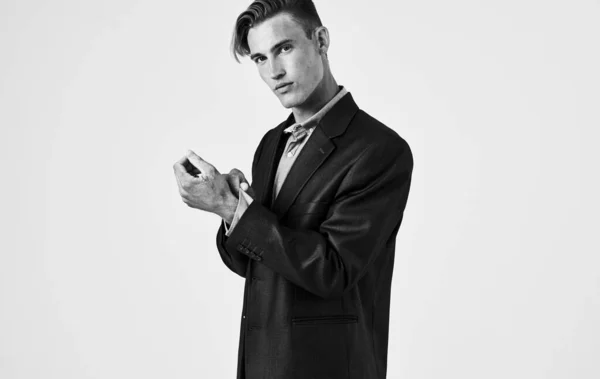 Portrait of a confident man in shirt and jacket black and white photograph cropped view — Stock Photo, Image