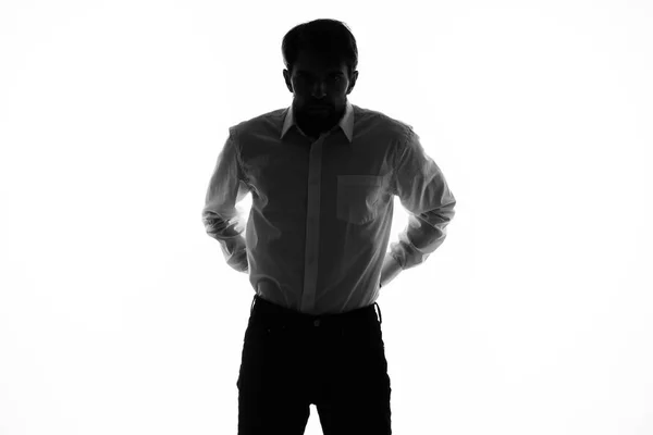 Schwarze Silhouette eines Mannes auf weißem Hintergrund — Stockfoto