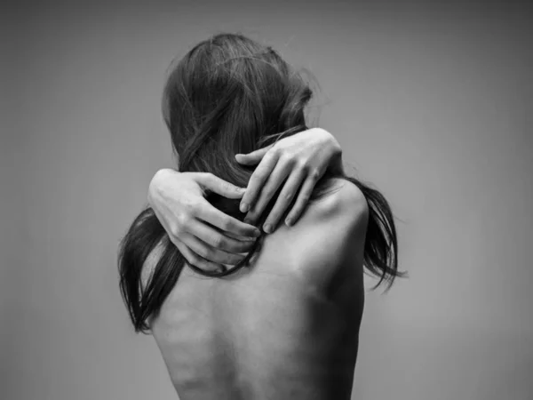 Black and white photography portrait of woman with naked back cropped view — Stock Photo, Image