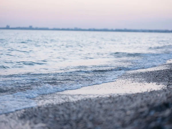 Nature ocean sunset sand beach fresh air waves white foam — Stock Photo, Image