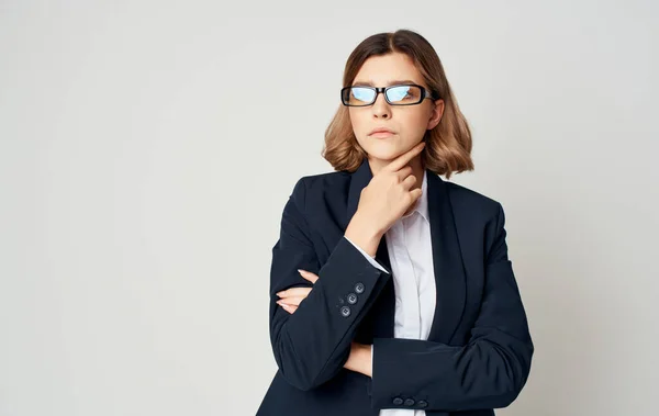 Business woman in classic suit on a light background Copy Space cropped view