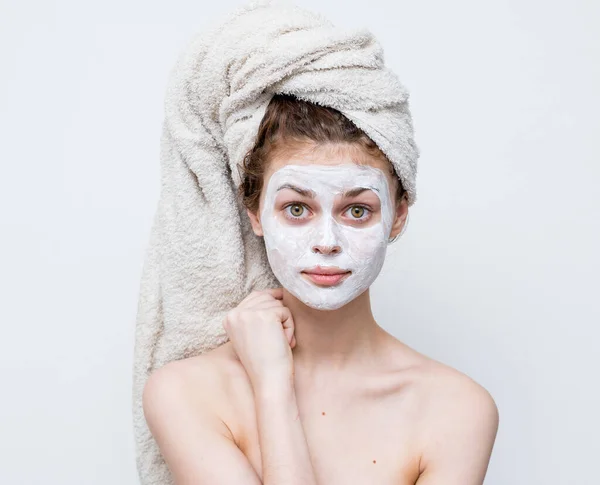 Pretty woman naked shoulders cream face mask skin care — Stock Photo, Image