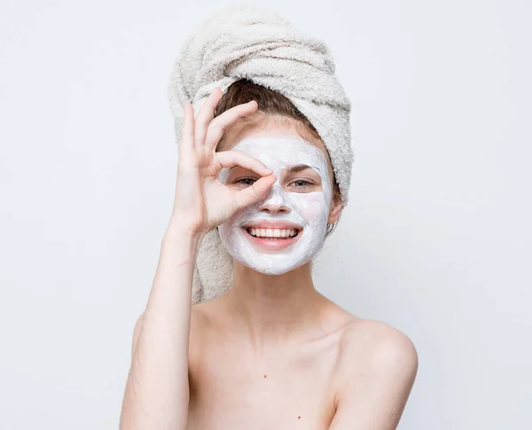 Woman with bare shoulders face mask clean skin — Stock Photo, Image