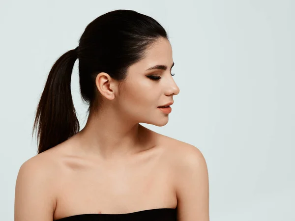 Beautiful woman with makeup naked shoulders side view — Stock Photo, Image