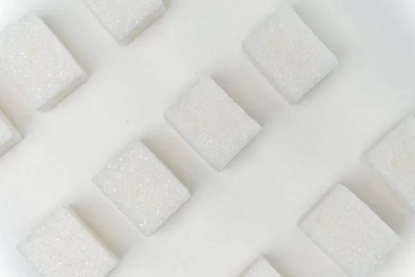 Suikerklontjes glucose ingrediënt calorieën energie licht achtergrond — Stockfoto