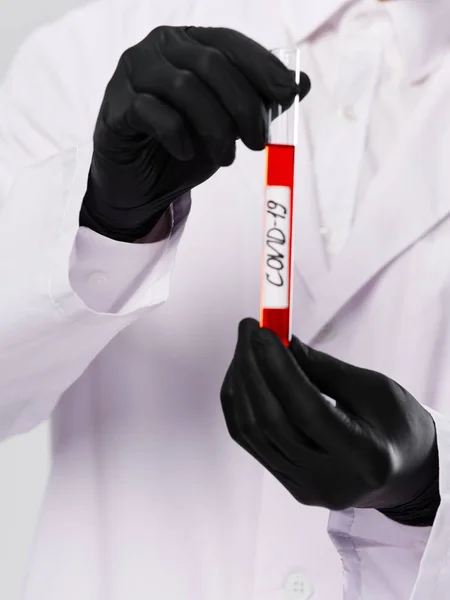 Black gloves blood test diagnostics research laboratory