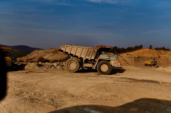 truck bulldozer sand construction work outdoors blue sky summer