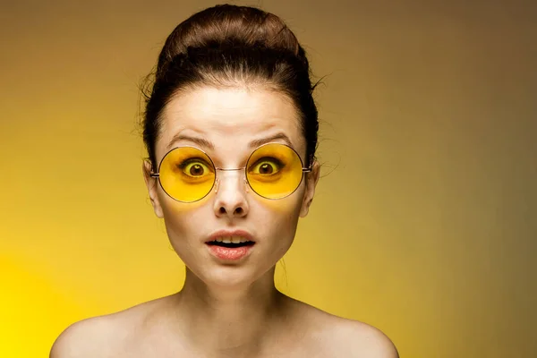 Cheerful woman wearing yellow glasses smile naked shoulders cropped view — Stock Photo, Image