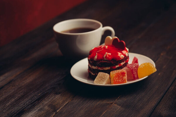 cake plates marmalade sweets close-up dessert wooden background