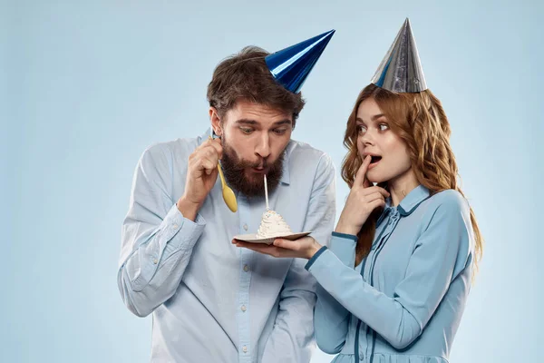 Birthday corporate young man and woman with cake on isolated background disco party — Stock Photo, Image