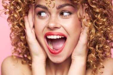 Charming model wide open mouth smile bright makeup 