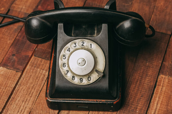 retro telephone nostalgia old technology communication wooden background